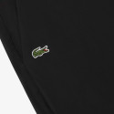 Pantalon Lacoste Stretch noir avec boutons à la taille et aux chevilles