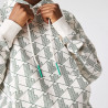 Sweatshirt à capuche unisexe Lacoste L!VE loose fit monogramme pour chez DM'Sports
