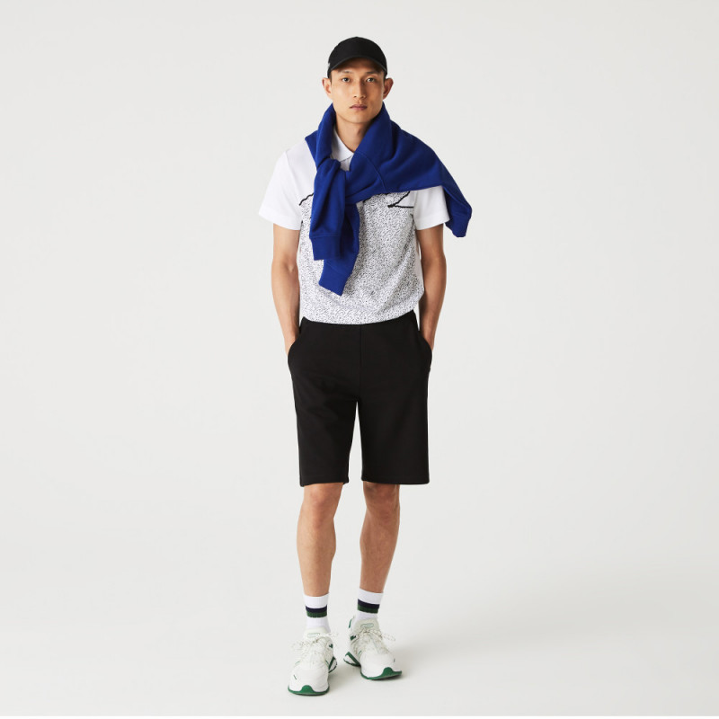 Le Short lacoste en coton mélangé bleu marine est chez DM'Sports !