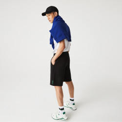 Le Short lacoste en coton mélangé bleu marine est chez DM'Sports !