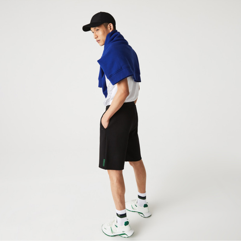 Le Short lacoste en coton mélangé bleu marine est chez DM'Sports !