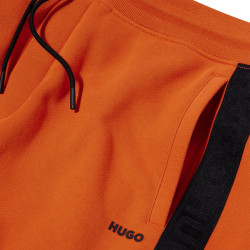 Détails bandes logo pantalon de survêtement Dumquat HUGO orange