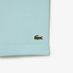 SHORT HOMME LACOSTE EN MOLLETON GRATTÉ DE COTON BIOLOGIQUE VERT PASTEL