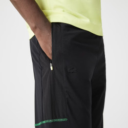 Pantalon fuselé à poches zippées