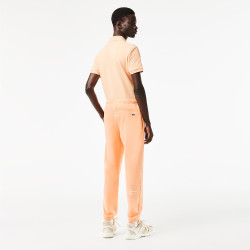Lacoste Pantalon de survêtement - orange clair/saumon 