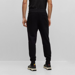 BAS DE SURVÊTEMENT NOIR RESSERRÉ AU BAS DES JAMBES