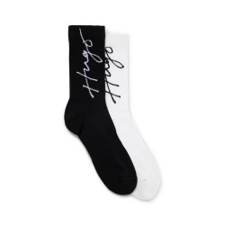 LOT DE DEUX PAIRES DE CHAUSSETTES A LOGOS MANUSCRITS HUGO NOIRES ET BLANCHES