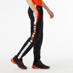 Pantalon de survêtement Lacoste SPORT avec bande Lacoste chez DMS