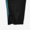 Pantalon de survêtement Lacoste SPORT avec bande Lacoste chez DMS