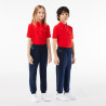Bas de survêtement Lacoste enfant avec finitions contrastées Chez DMS