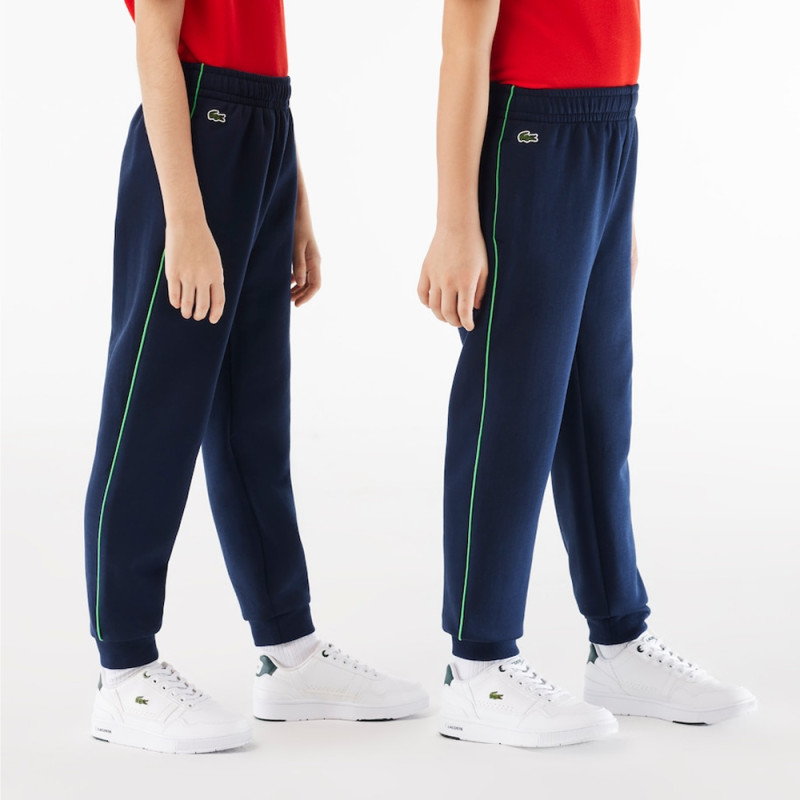Bas de survêtement Lacoste enfant avec finitions contrastées Chez DMS