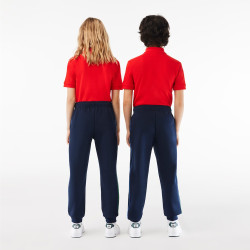 Bas de survêtement Lacoste enfant avec finitions contrastées Chez DMS