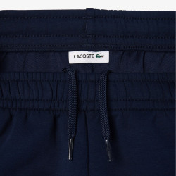 Bas de survêtement Lacoste enfant avec finitions contrastées Chez DMS
