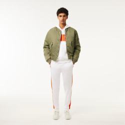 PANTALON DE SURVÊTEMENT LACOSTE COLOR-BLOCK BLANC ET ORANGE