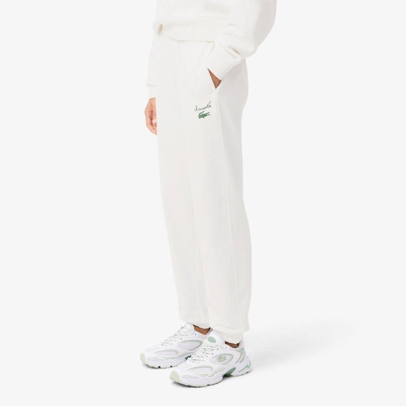 Pantalon de survêtement Lacoste Femme molleton siglé Chez DMS