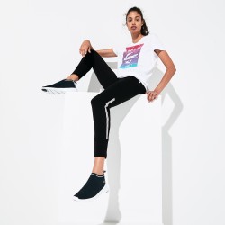 Jogging Tennis Lacoste SPORT noir et blanc en molleton avec bandes signature