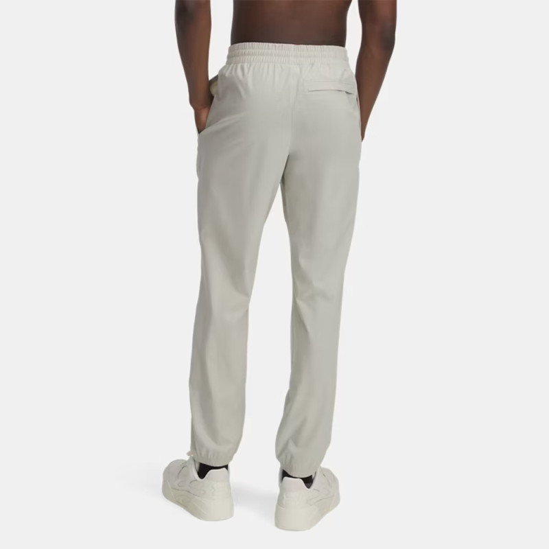 Pantalon de Jogging Beige Under Armour Vibe Woven pour Homme – Performance et Style au Quotidien