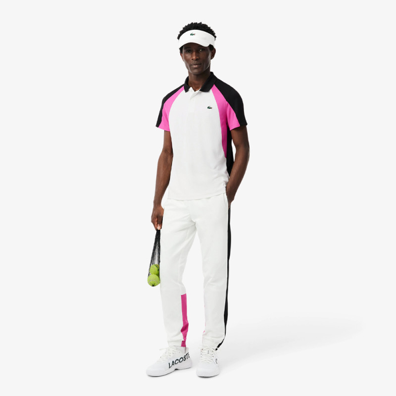 Polo Rose et Noir Lacoste Tennis color-block imprimé – Élégance sportive et performance
