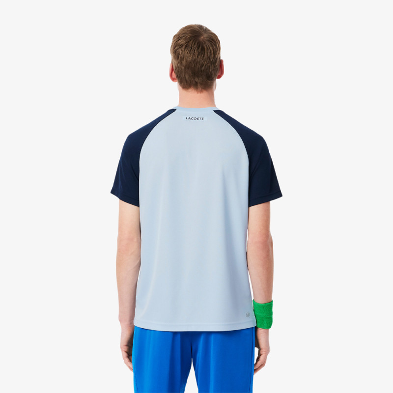 T-shirt Bleu Clair Lacoste Tennis color-block Ultra Dry – Performance et style sur le court