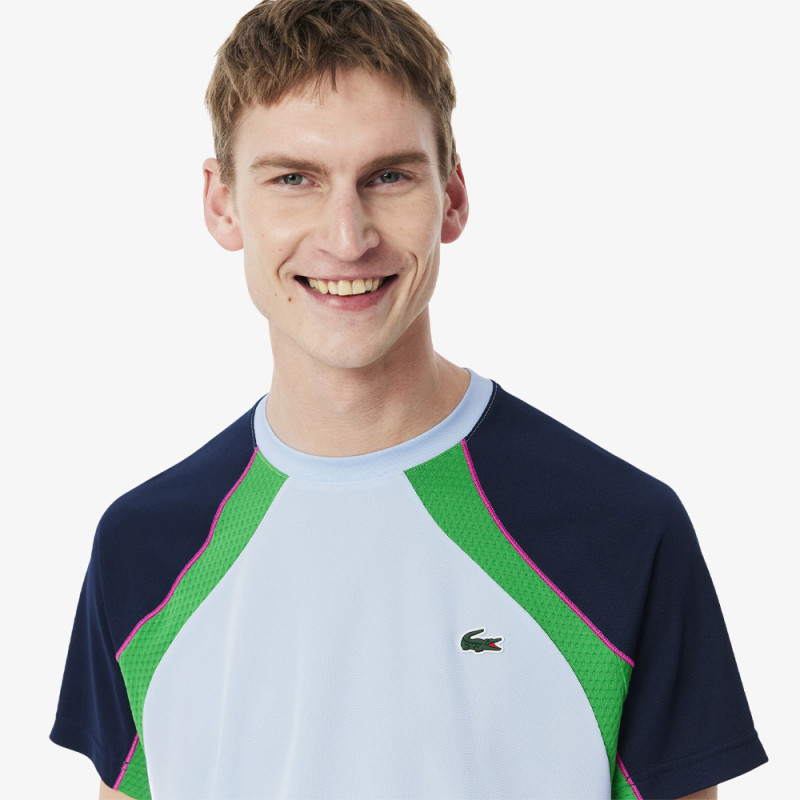 T-shirt Bleu Clair Lacoste Tennis color-block Ultra Dry – Performance et style sur le court