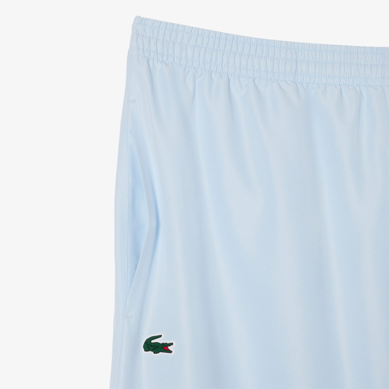 Pantalon de Survêtement Homme Lacoste Sport – Bleu Clair – Tissu Léger & Confort Optimal