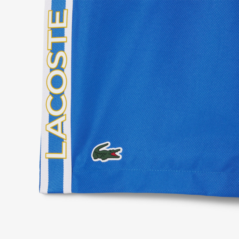 Short Homme Lacoste Tennis – Bleu – Bandes Griffées & Tissu Léger Performant