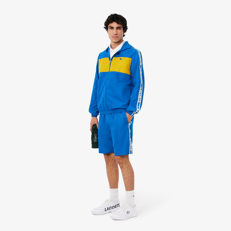 Short Homme Lacoste Tennis – Bleu – Bandes Griffées & Tissu Léger Performant