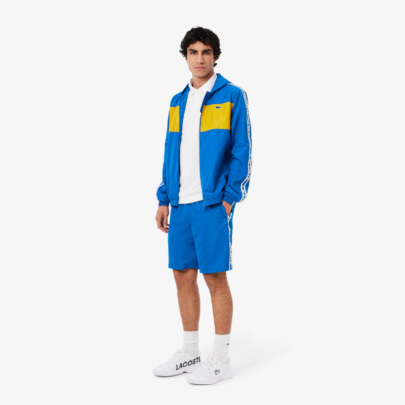 Short Homme Lacoste Tennis – Bleu – Bandes Griffées & Tissu Léger Performant