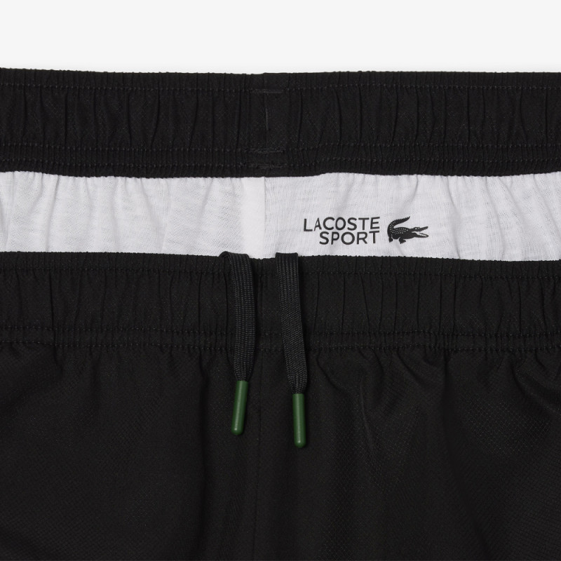 Short Homme Lacoste Tennis – Noir – Bandes Griffées & Tissu Léger Performant