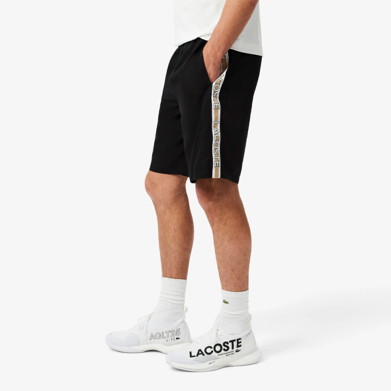 Short Homme Lacoste Tennis – Noir – Bandes Griffées & Tissu Léger Performant