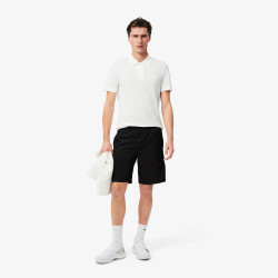 Short Homme Lacoste Tennis – Noir – Bandes Griffées & Tissu Léger Performant