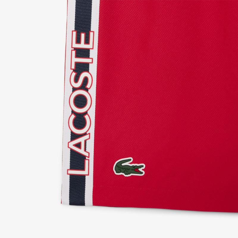 Short Homme Lacoste Tennis – Rouge – Bandes Griffées & Tissu Léger Performant