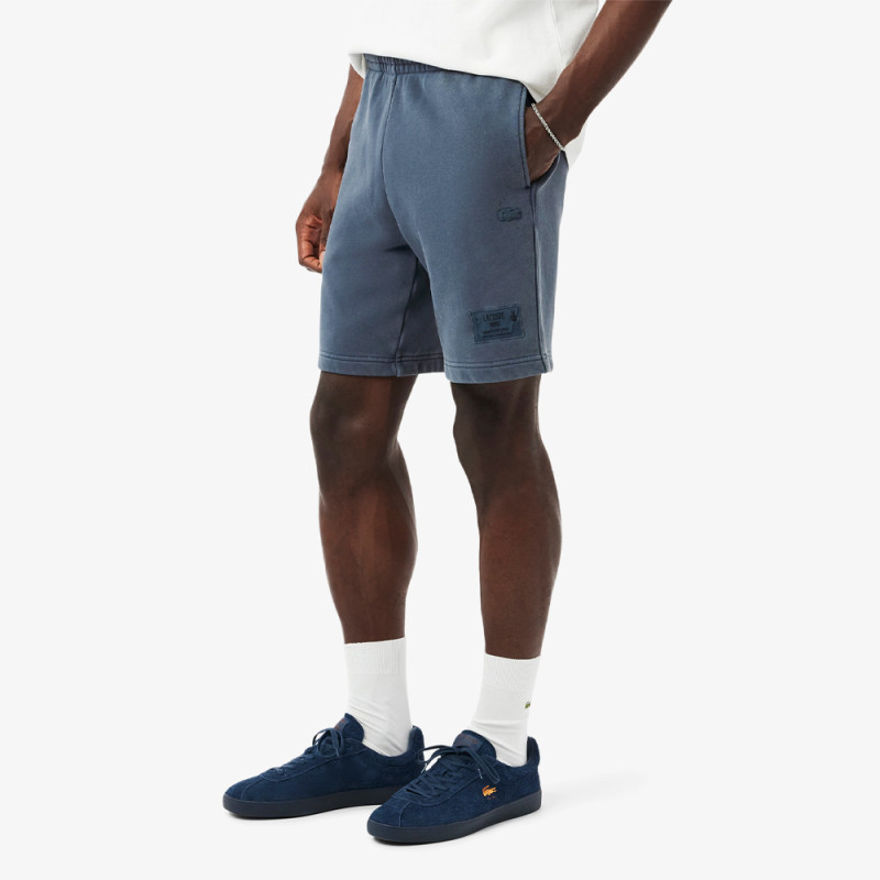Short Homme Lacoste – Bleu Effet Délavé – Molleton de Coton Bio & Style Authentique