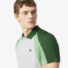 Polo Blanc et Vert Lacoste Tennis color-block imprimé – Élégance sportive et performance