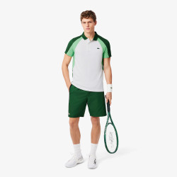 Polo Blanc et Vert Lacoste Tennis color-block imprimé – Élégance sportive et performance