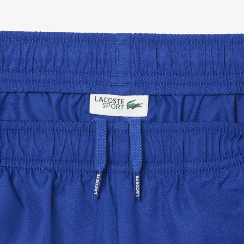 Short Tennis Enfant Lacoste – Bleu/Blanc – Taffetas Diamanté Recyclé & Détails Iconiques