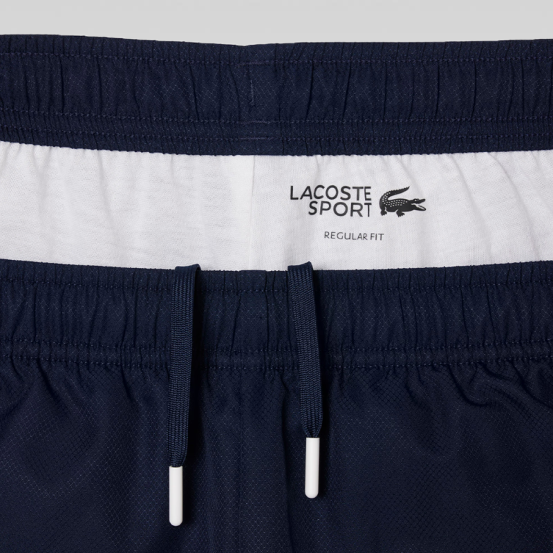 Pantalon de survetement Lacoste sport Bleu avec imprimé -  Confort & Style Athlétique