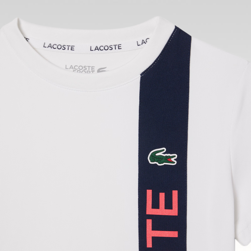 T-shirt Enfant Lacoste Tennis – Blanc et Bleu Marine – Piqué Ultra Dry & Design Sportif