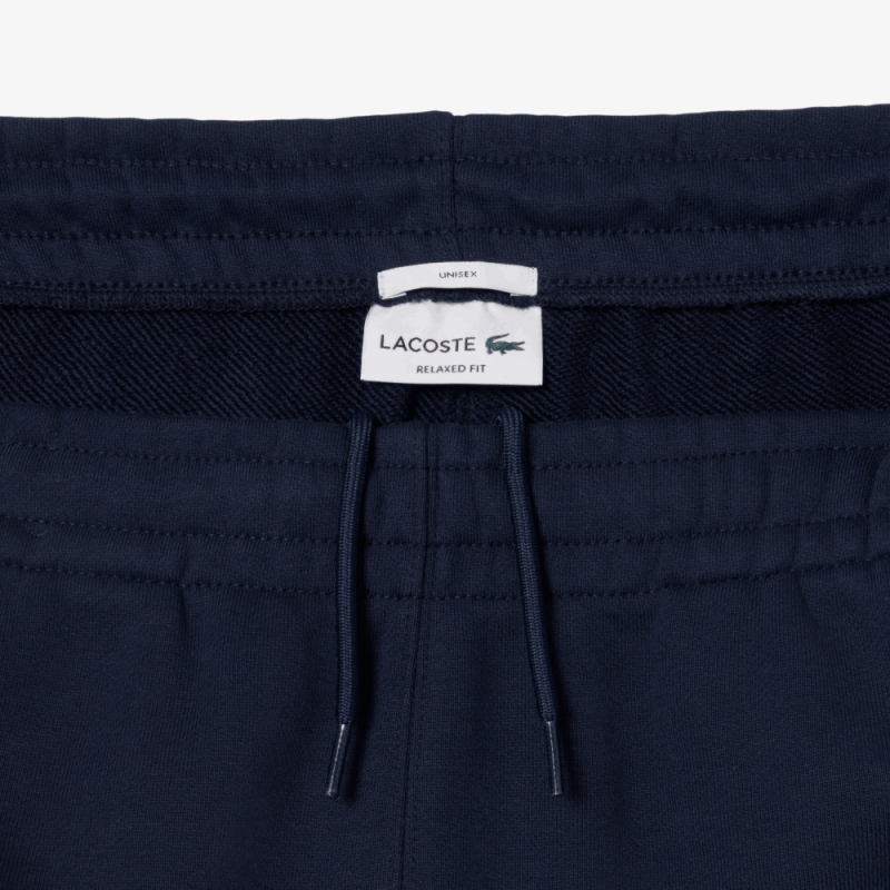 Pantalon de survêtement Lacoste – Bleu Nuit – en molleton Unisexe Chez DM'Sports Lyon