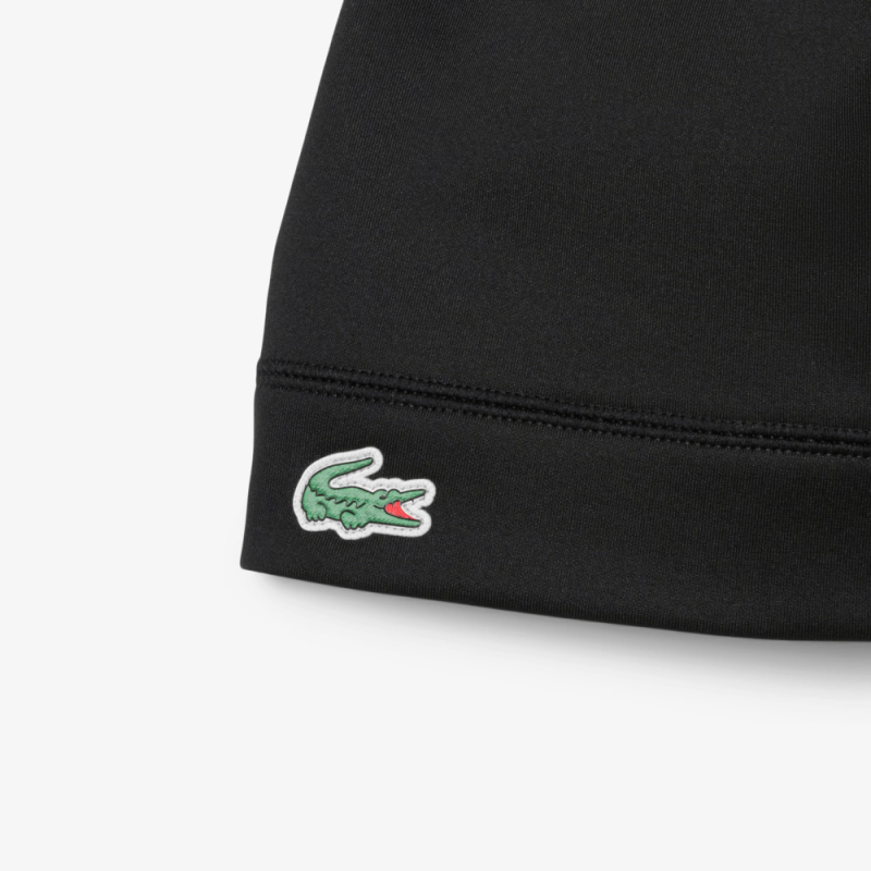 Bonnet Lacoste -Noir- sport en polaire réfléchissant motif crocodile