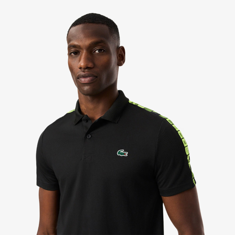 Polo Lacoste Sport bande siglée ultra dry Noir et Jaune - Confort & Performance