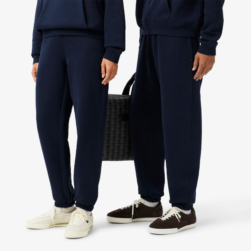 Pantalon de survêtement Lacoste – Bleu Nuit – en molleton Unisexe Chez DM'Sports Lyon