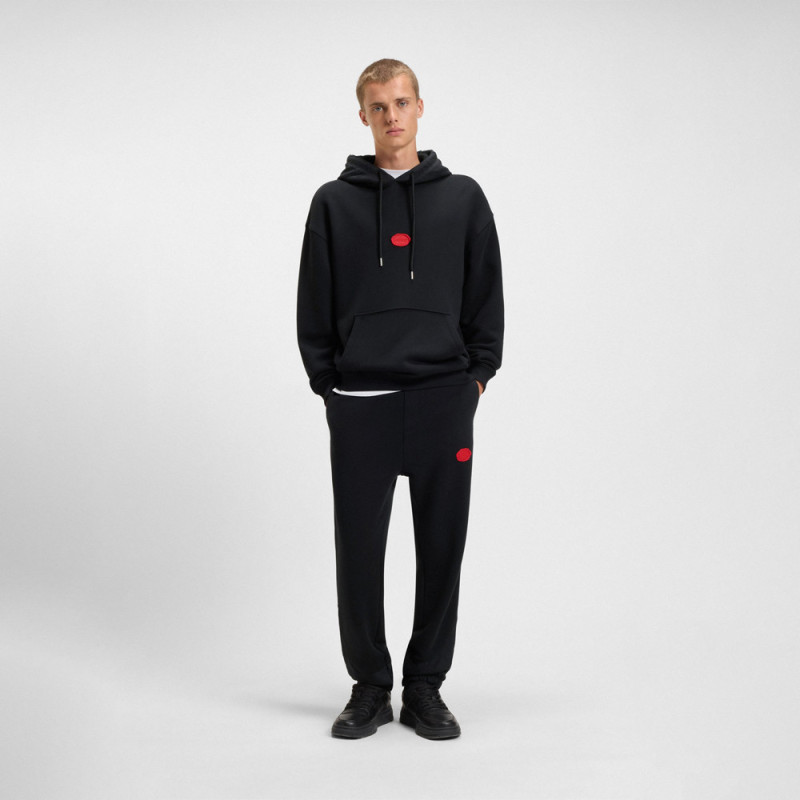 Bas de survêtement Dilvanos HUGO en coton mélangé avec logo estampé à la cire noir