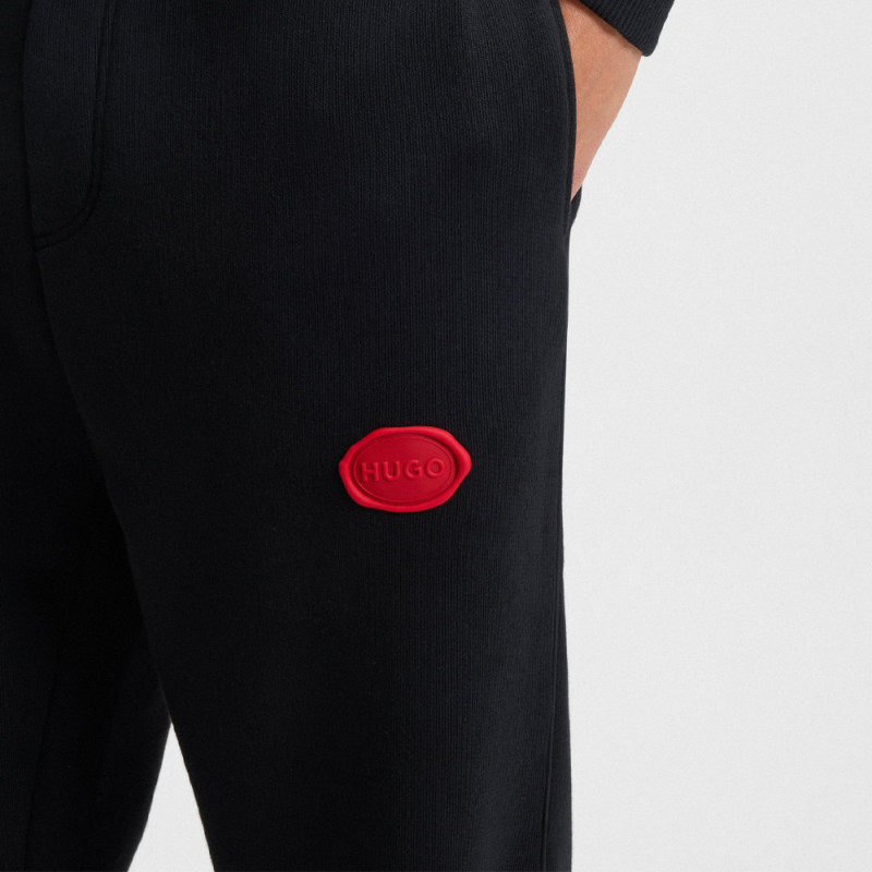 Bas de survêtement Dilvanos HUGO en coton mélangé avec logo estampé à la cire noir