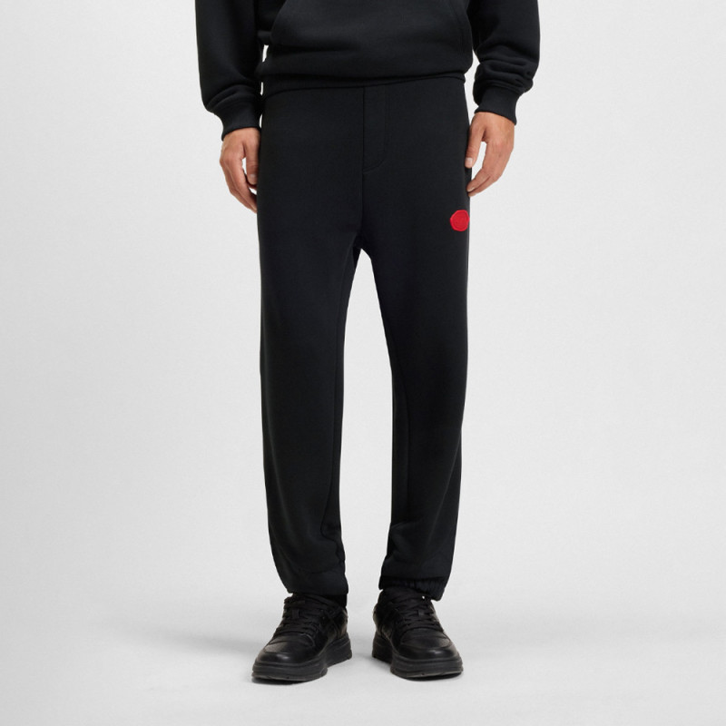 Bas de survêtement Dilvanos HUGO en coton mélangé avec logo estampé à la cire noir