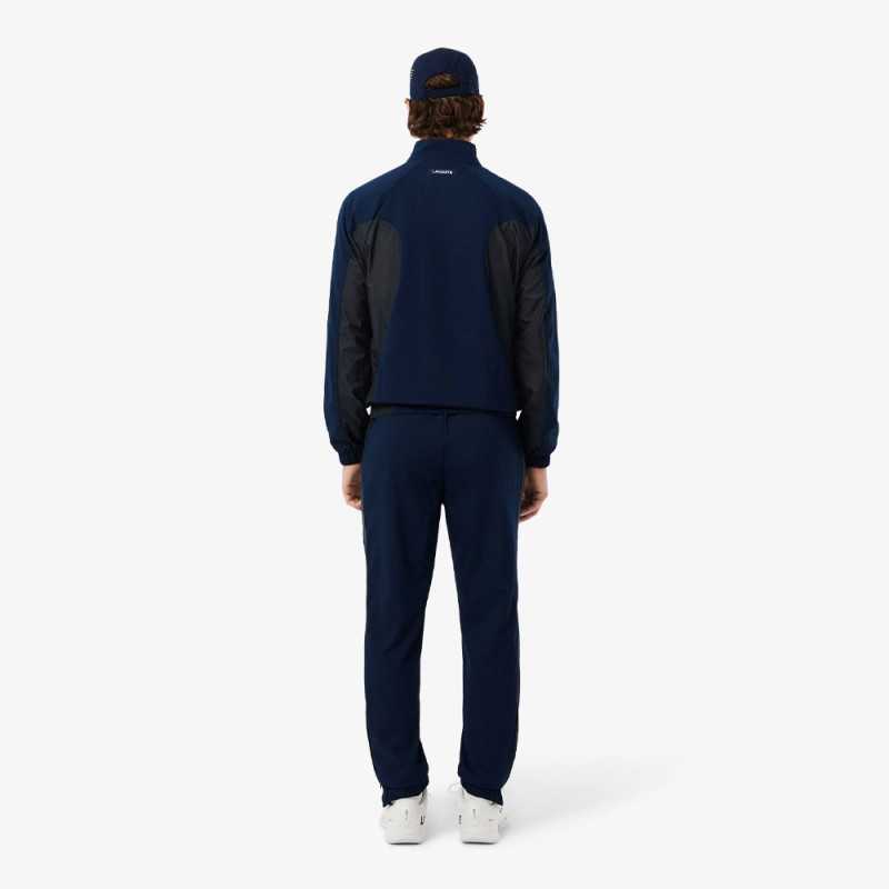 Ensemble survêtement Tennis déperlant LACOSTE bleu marine
