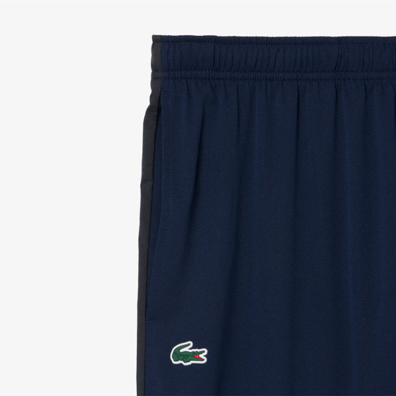 Ensemble survêtement Tennis déperlant LACOSTE bleu marine