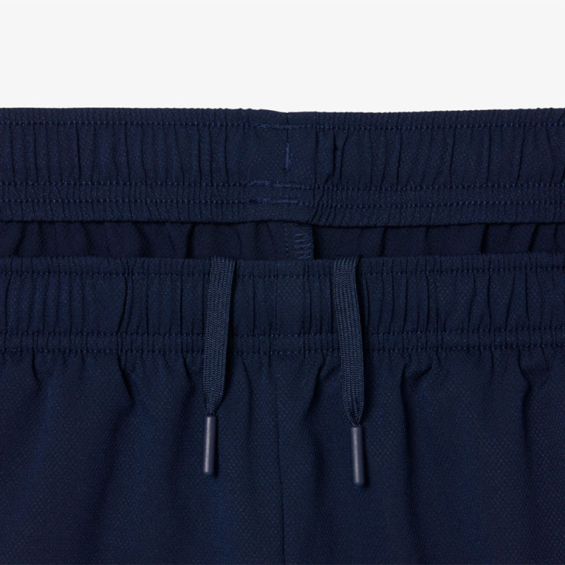 Ensemble survêtement Tennis déperlant LACOSTE bleu marine