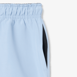 Short de bain Lacoste junior uni en taffetas LACOSTE bleu clair  Short de bain Lacoste junior uni en taffetas LACOSTE bleu clair