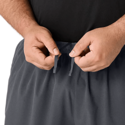 Pantalon ASICS CORE Woven – Léger, Séchage Rapide et Respirant Gris